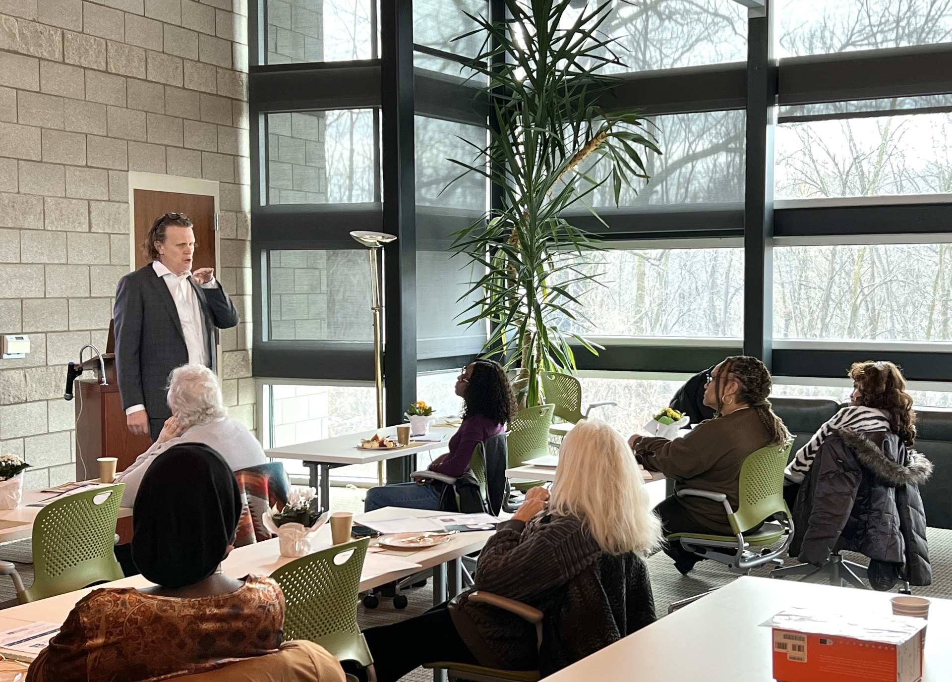 Speaker presenting to attendees at a daytime educational event